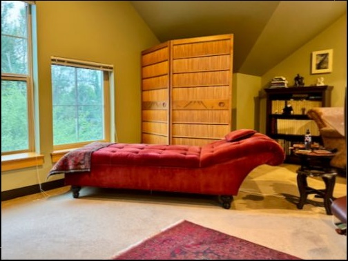 Consulting room with red psychoanalytic couch
